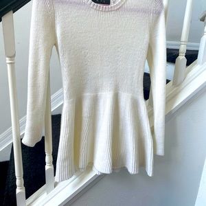 White peplum sweater
